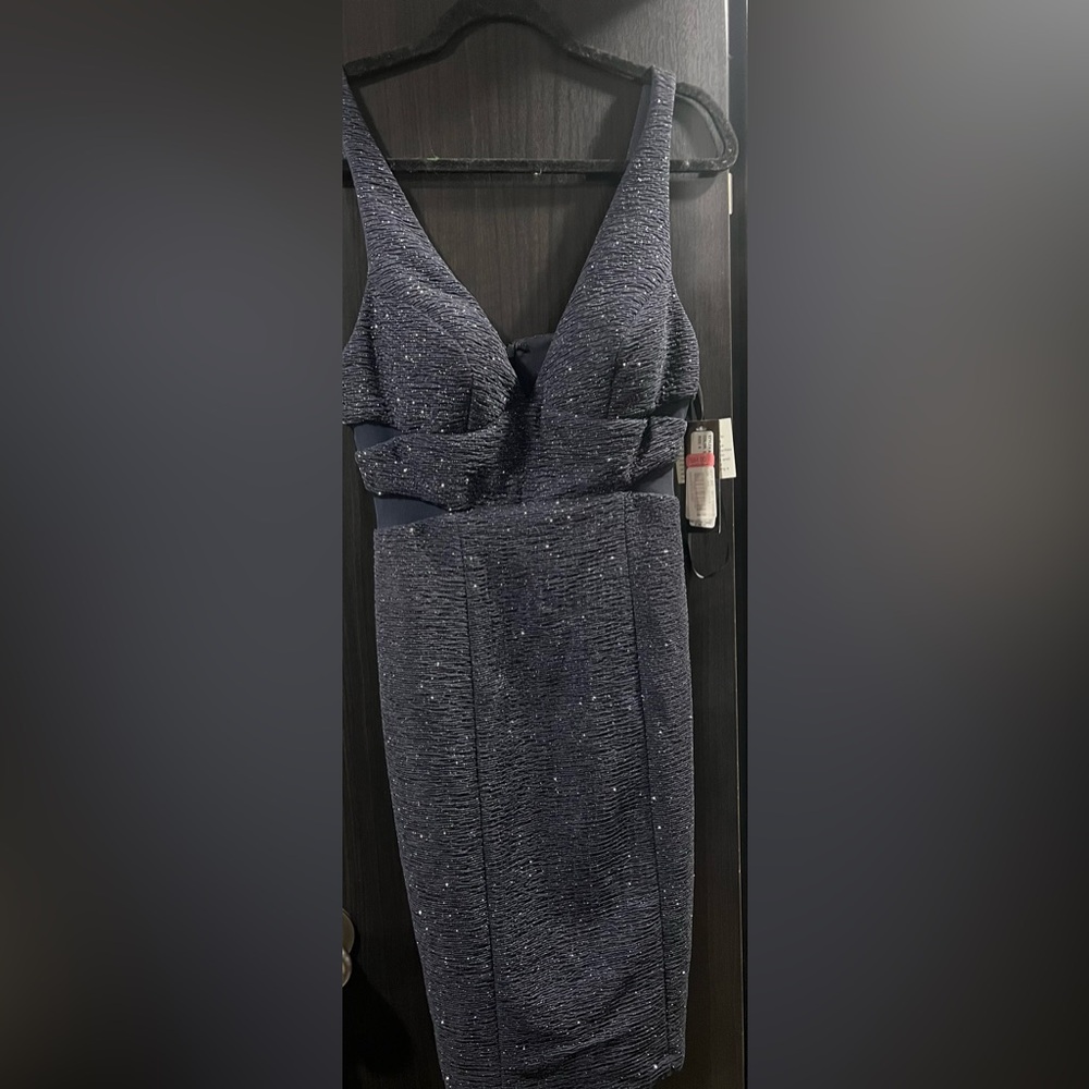Betsy & Adam formal dress. Size 8. Knee length. From Dillards. W/ tags on it.